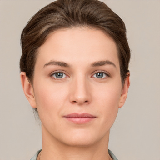 Neutral white young-adult female with short  brown hair and brown eyes