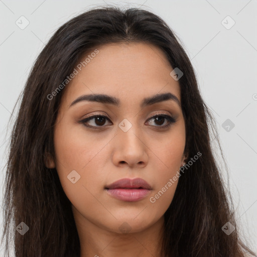 Neutral latino young-adult female with long  brown hair and brown eyes