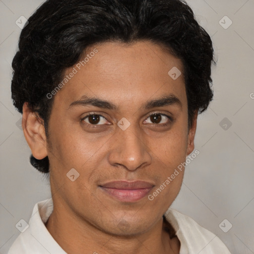 Joyful latino young-adult male with short  brown hair and brown eyes