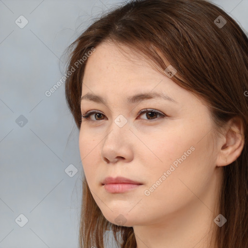 Neutral white young-adult female with long  brown hair and brown eyes