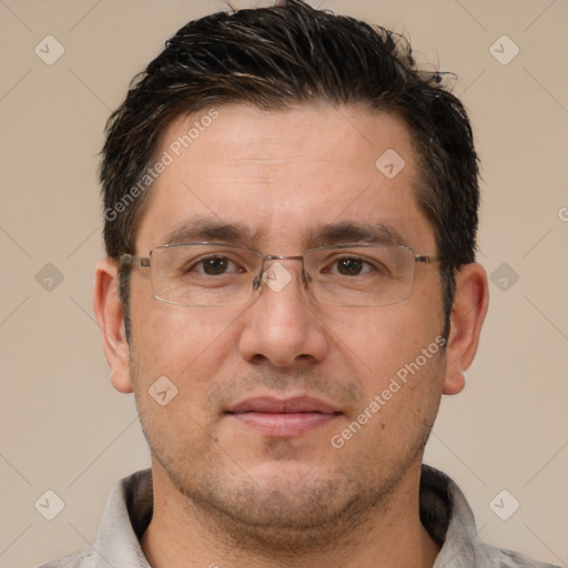 Joyful white adult male with short  brown hair and brown eyes