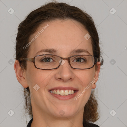 Joyful white adult female with short  brown hair and grey eyes