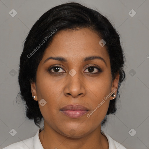 Joyful black young-adult female with medium  black hair and brown eyes