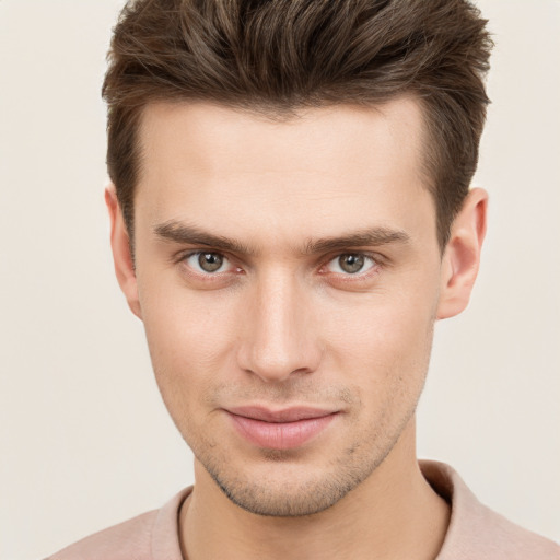 Neutral white young-adult male with short  brown hair and brown eyes