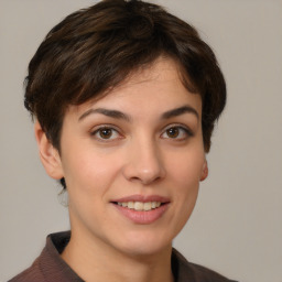 Joyful white young-adult female with medium  brown hair and brown eyes