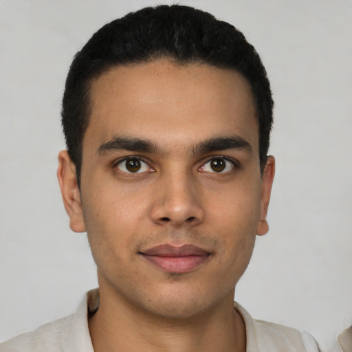 Neutral latino young-adult male with short  black hair and brown eyes