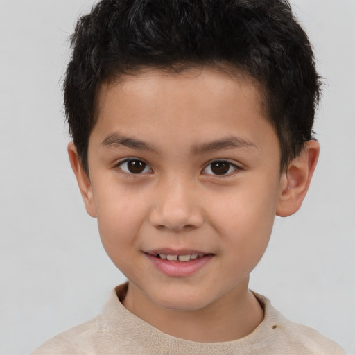 Joyful white child male with short  brown hair and brown eyes