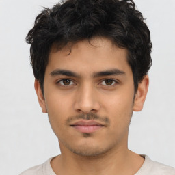 Neutral asian young-adult male with short  brown hair and brown eyes