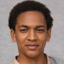 Joyful latino young-adult male with short  brown hair and brown eyes