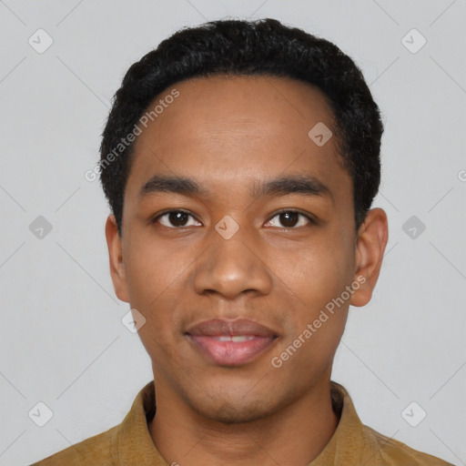Joyful black young-adult male with short  black hair and brown eyes