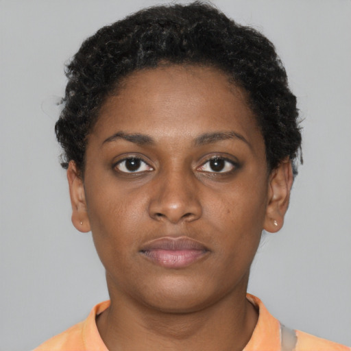 Neutral latino young-adult female with short  brown hair and brown eyes