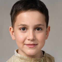 Joyful white child male with short  brown hair and brown eyes