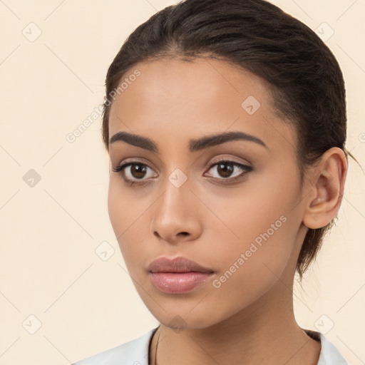 Neutral white young-adult female with long  brown hair and brown eyes