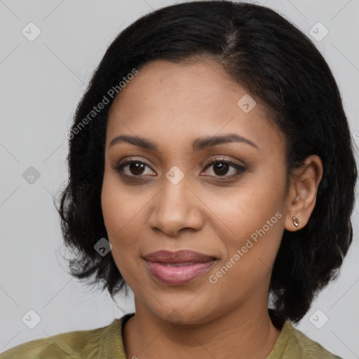 Joyful black young-adult female with medium  black hair and brown eyes