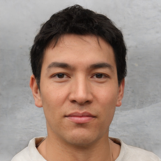 Neutral white young-adult male with short  black hair and brown eyes