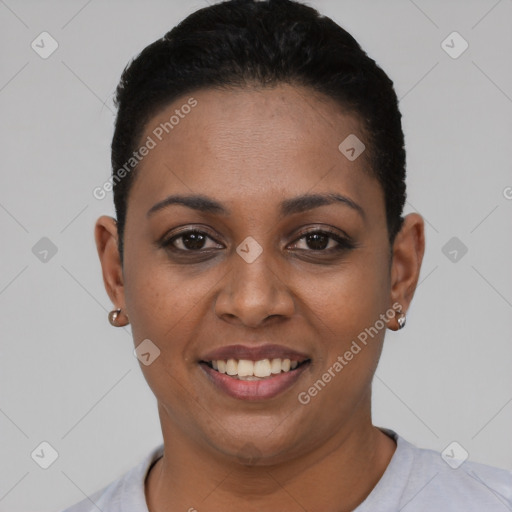 Joyful latino young-adult female with short  black hair and brown eyes