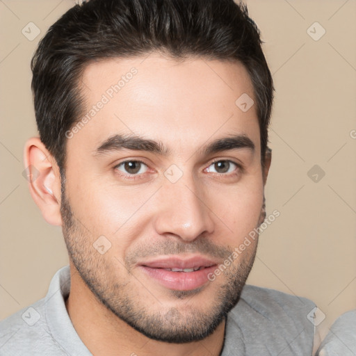 Joyful white young-adult male with short  brown hair and brown eyes