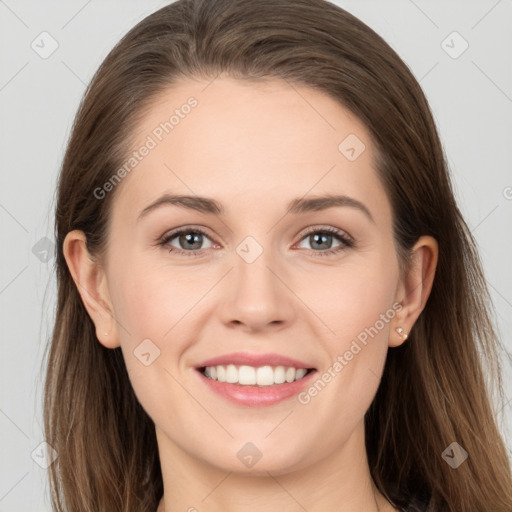 Joyful white young-adult female with long  brown hair and grey eyes