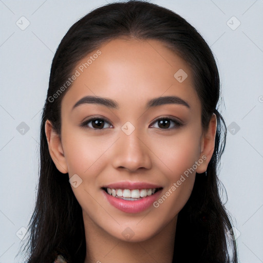 Joyful white young-adult female with long  brown hair and brown eyes