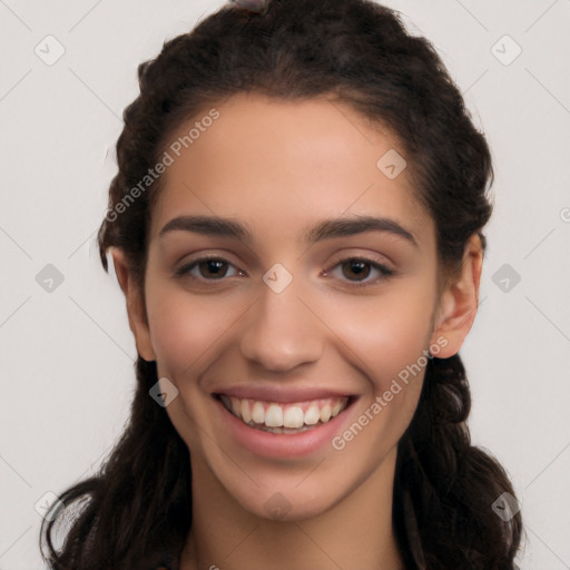 Joyful white young-adult female with long  black hair and brown eyes