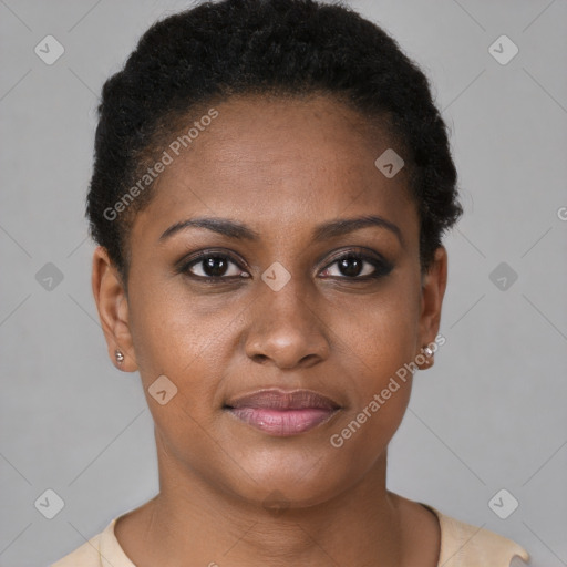 Joyful black young-adult female with short  brown hair and brown eyes