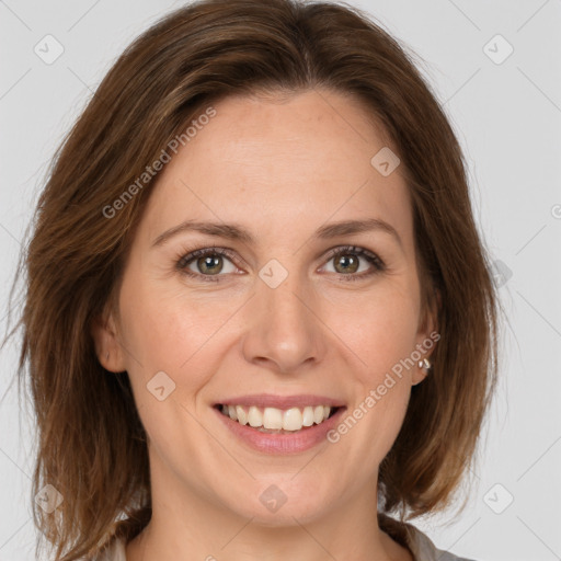 Joyful white young-adult female with medium  brown hair and green eyes