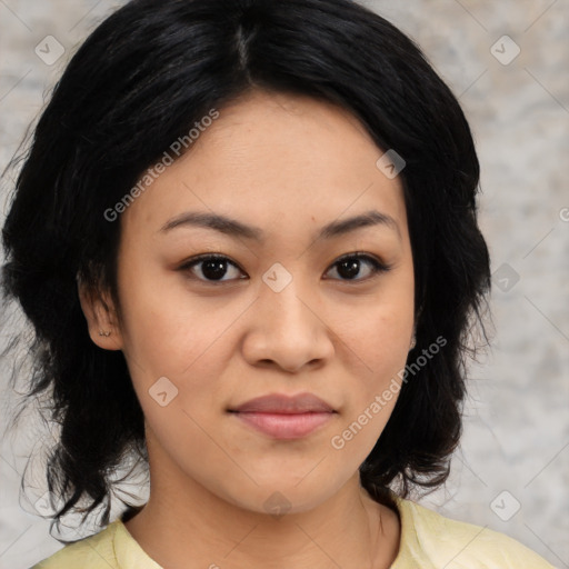 Joyful asian young-adult female with medium  black hair and brown eyes