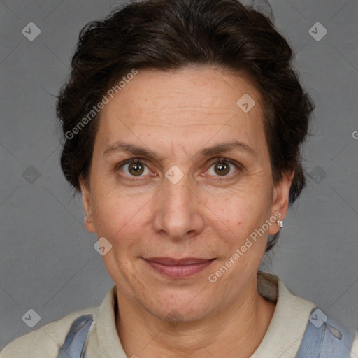 Joyful white adult female with short  brown hair and brown eyes