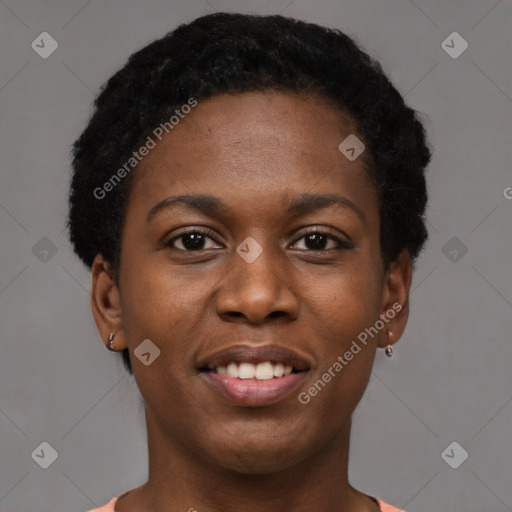 Joyful black young-adult female with short  black hair and brown eyes