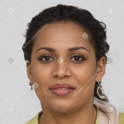 Joyful latino young-adult female with short  brown hair and brown eyes