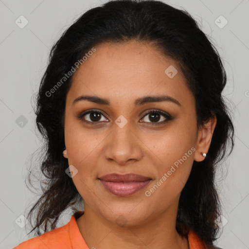 Joyful latino young-adult female with medium  brown hair and brown eyes