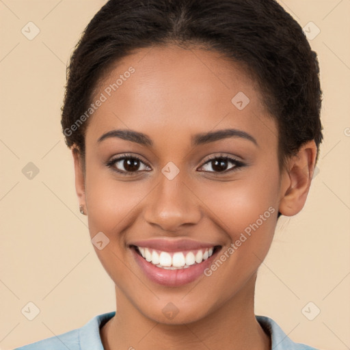 Joyful latino young-adult female with short  brown hair and brown eyes