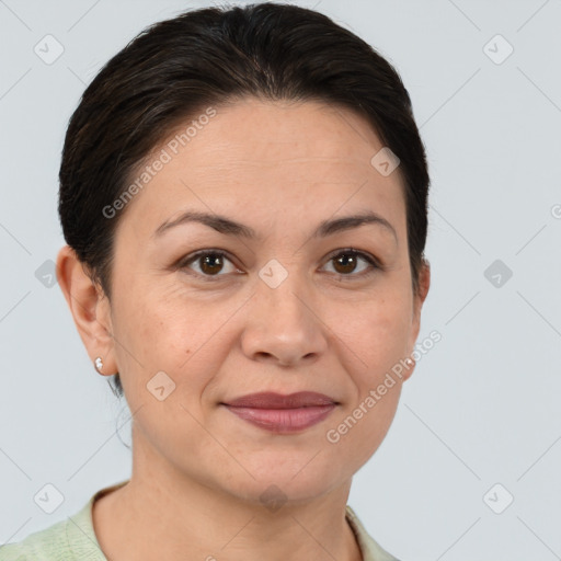 Joyful white adult female with short  brown hair and brown eyes