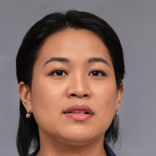 Neutral asian young-adult female with medium  black hair and brown eyes