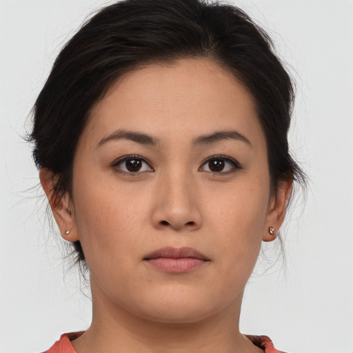 Neutral asian young-adult female with medium  brown hair and brown eyes