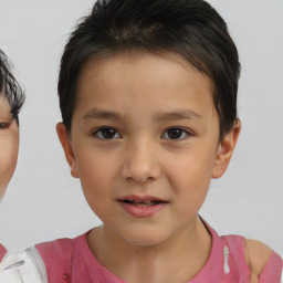 Joyful white child male with short  brown hair and brown eyes