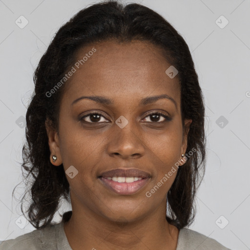 Joyful black young-adult female with medium  brown hair and brown eyes