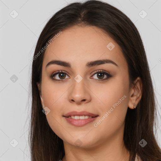 Joyful white young-adult female with long  brown hair and brown eyes