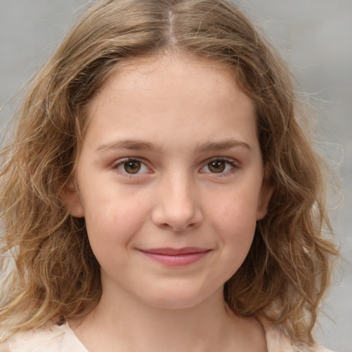 Joyful white child female with medium  brown hair and brown eyes