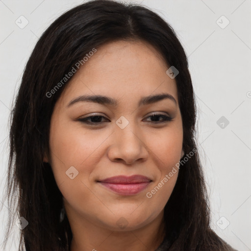 Joyful latino young-adult female with long  brown hair and brown eyes