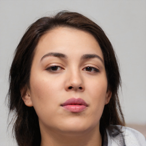 Neutral white young-adult female with medium  brown hair and brown eyes