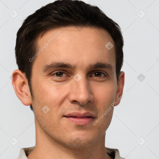 Joyful white young-adult male with short  brown hair and brown eyes