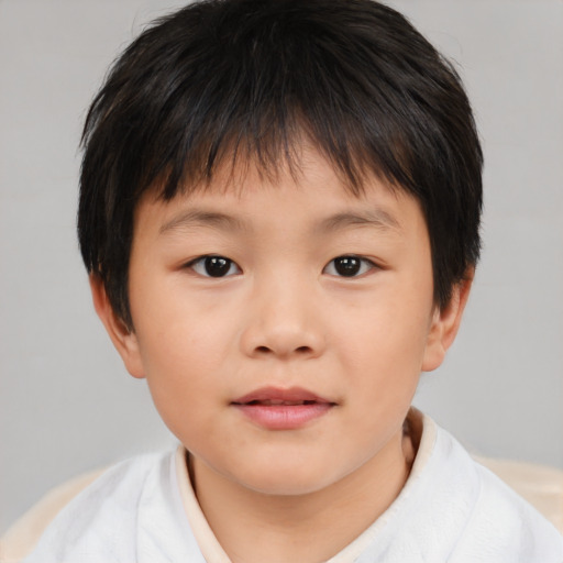 Neutral asian child male with short  brown hair and brown eyes