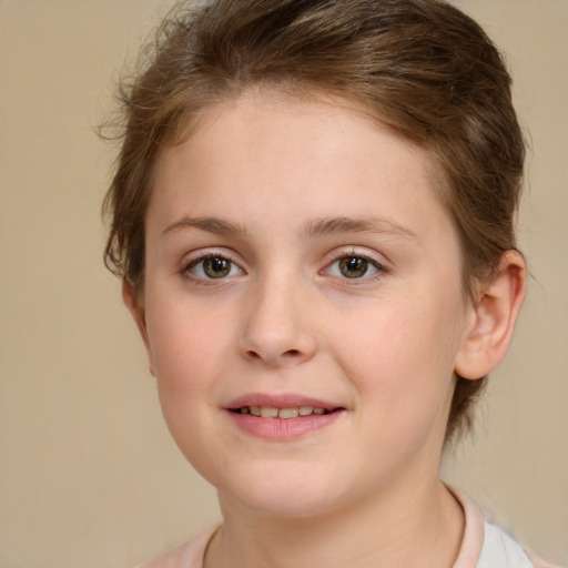 Joyful white child female with short  brown hair and brown eyes