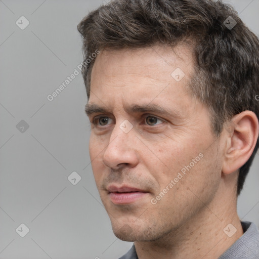 Neutral white adult male with short  brown hair and brown eyes