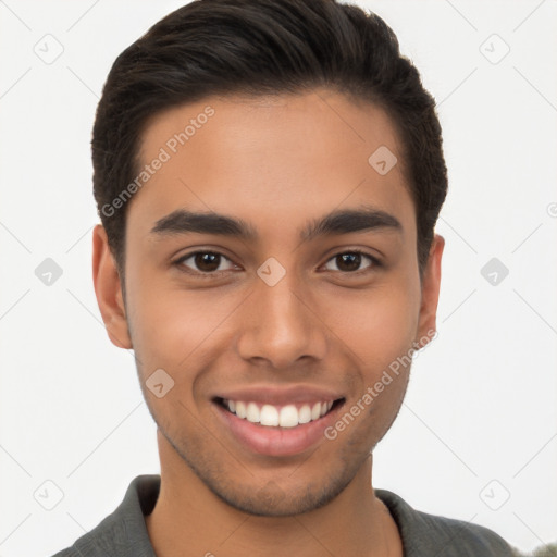 Joyful latino young-adult male with short  brown hair and brown eyes