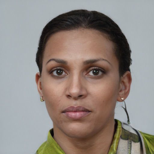 Neutral white young-adult female with short  brown hair and brown eyes