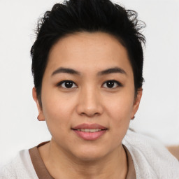 Joyful asian young-adult female with short  brown hair and brown eyes