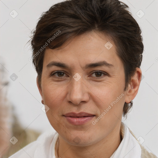 Joyful white adult female with short  brown hair and brown eyes