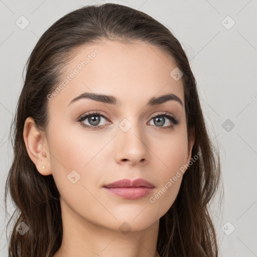 Neutral white young-adult female with long  brown hair and brown eyes